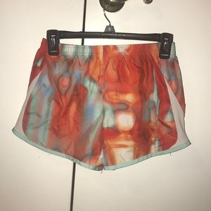 Nike orange and blue tie dye running shorts